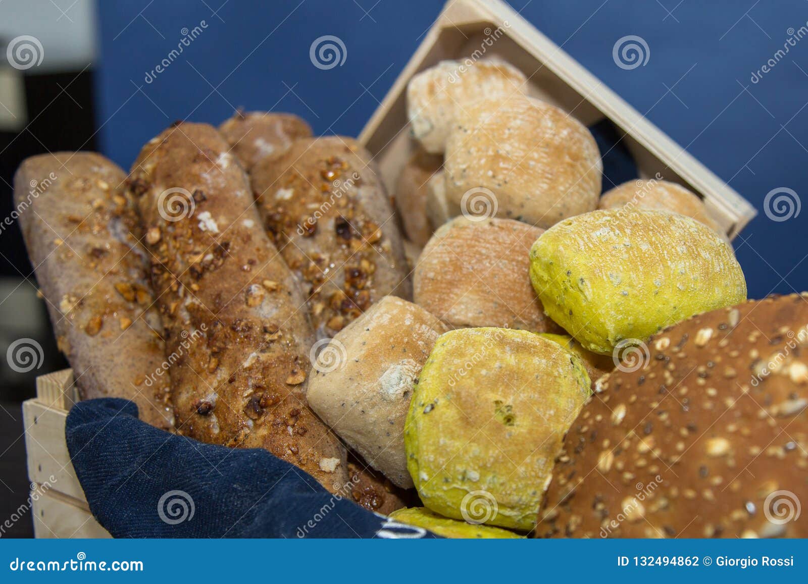 Group of Various Types of Bread, and Loaves Inside a Bakery Stock Photo