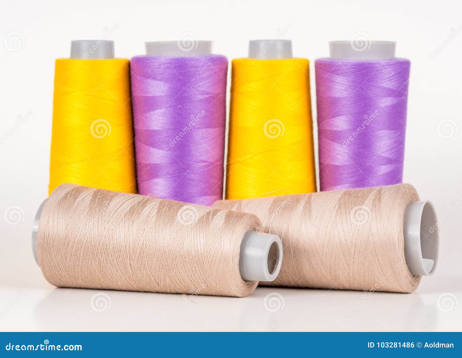 Vary colored thread coils stock photo. Image of industry 103281486