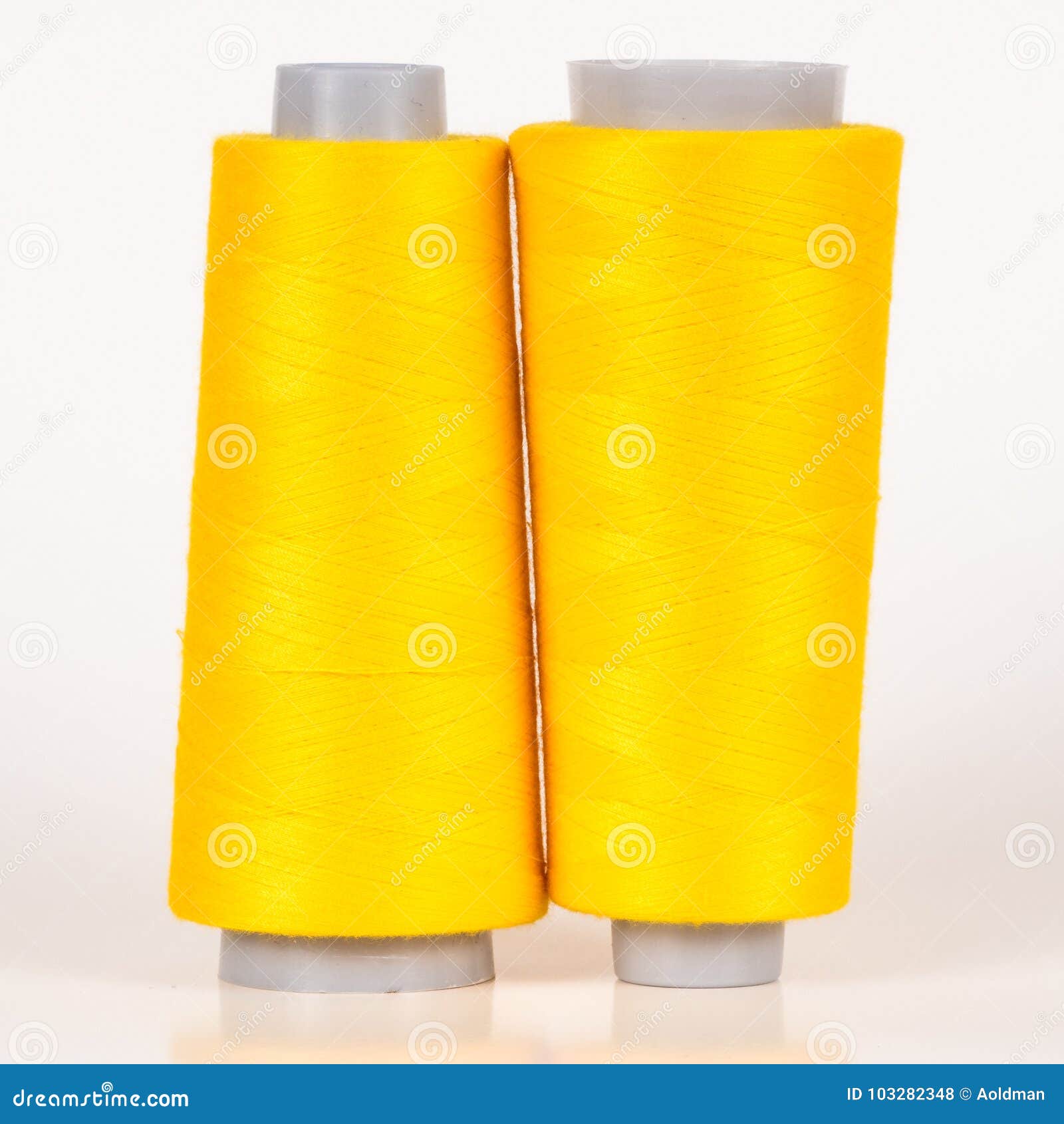 Vary colored thread coils stock photo. Image of multiple 103282348