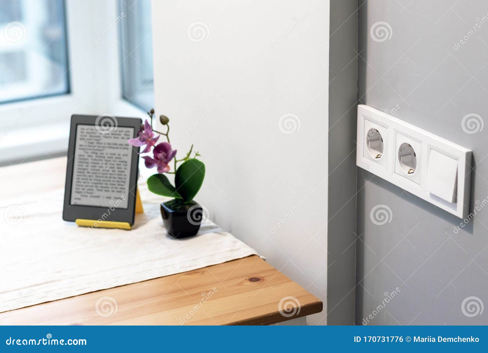 Group of White European Electrical Outlets and a Switch Located on a