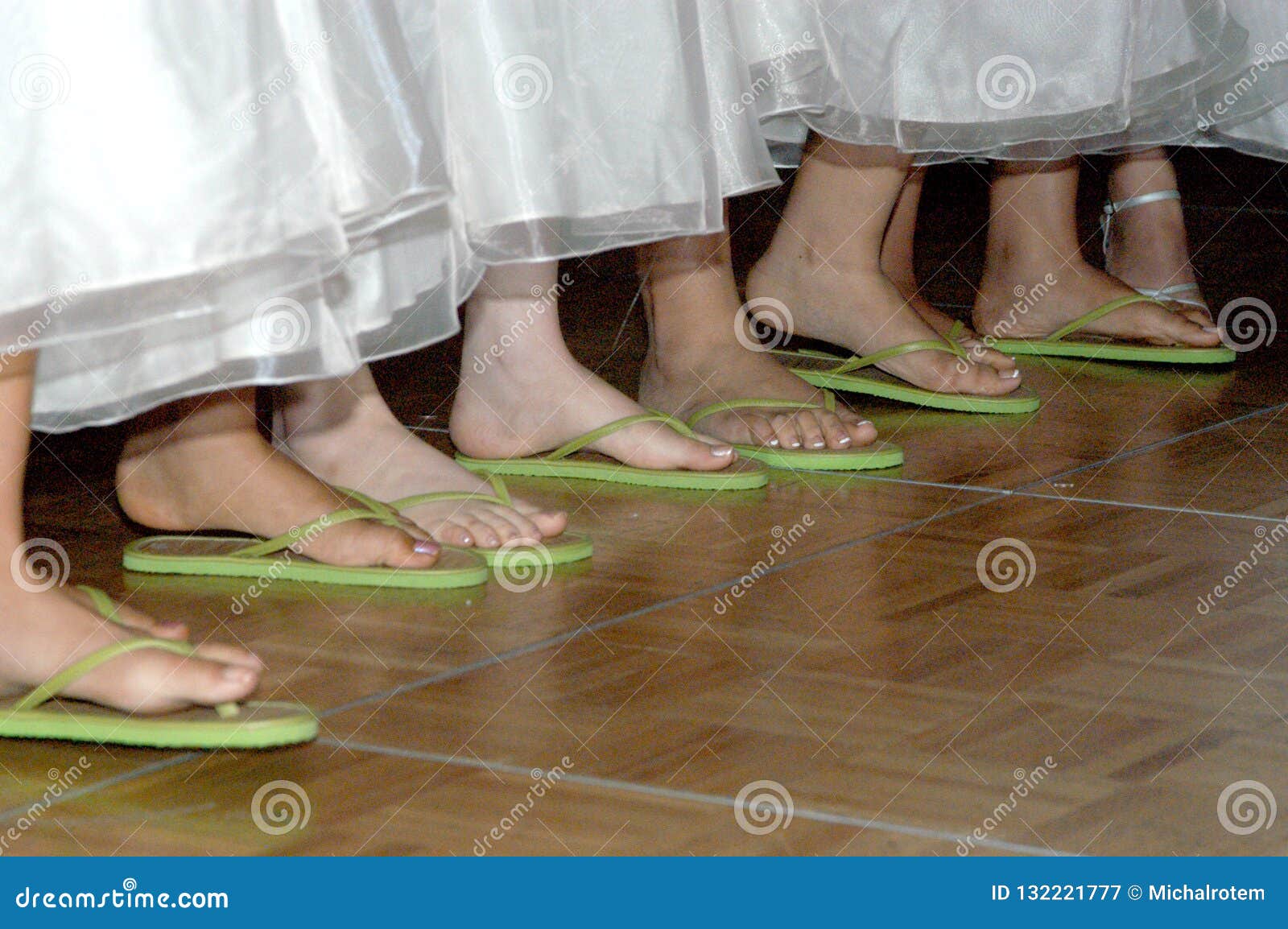 Women Wearing Flip Flops Dancing Stock 