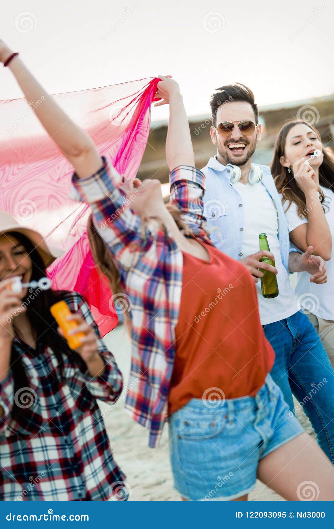 Group of Young Cheerful People Bonding To Each Other and Smiling Stock ...