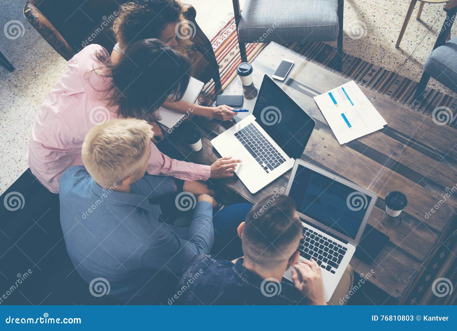 group young coworkers making great business decisions. creative team discussion corporate work concept modern office. new