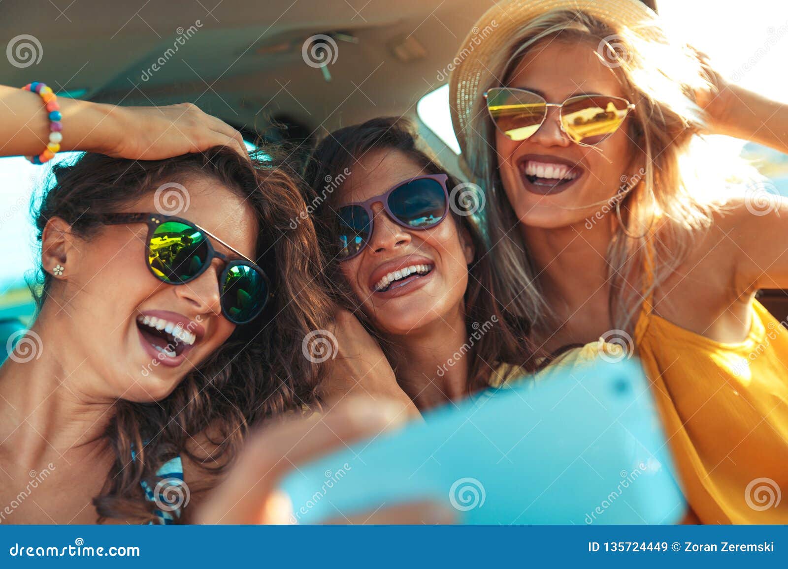 Three Female Friends Enjoying Traveling in the Car. Stock Image - Image ...