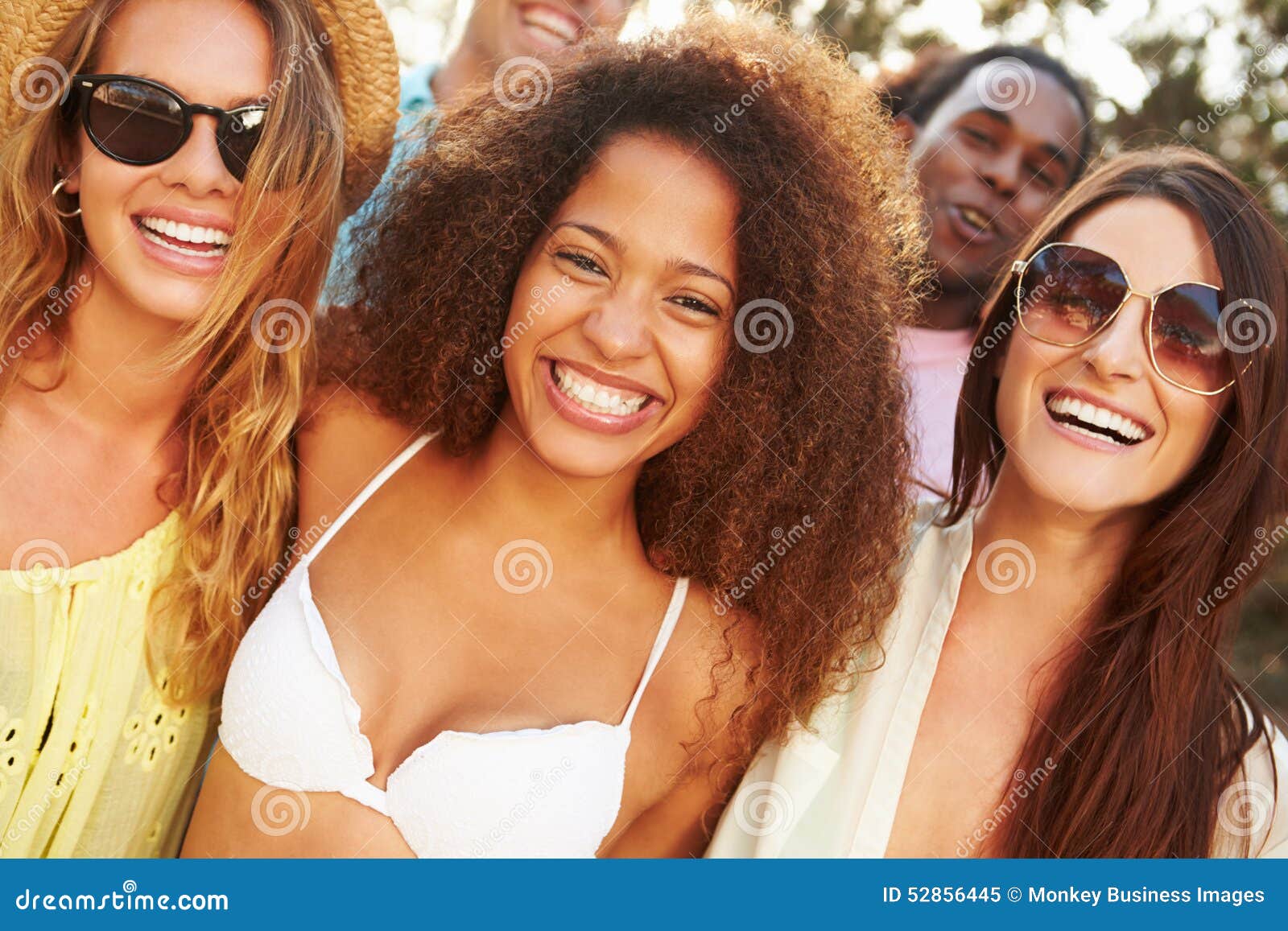 Large Group Of Young People Enjoying A Beach Party Stock Photo, Picture and  Royalty Free Image. Image 21131228.