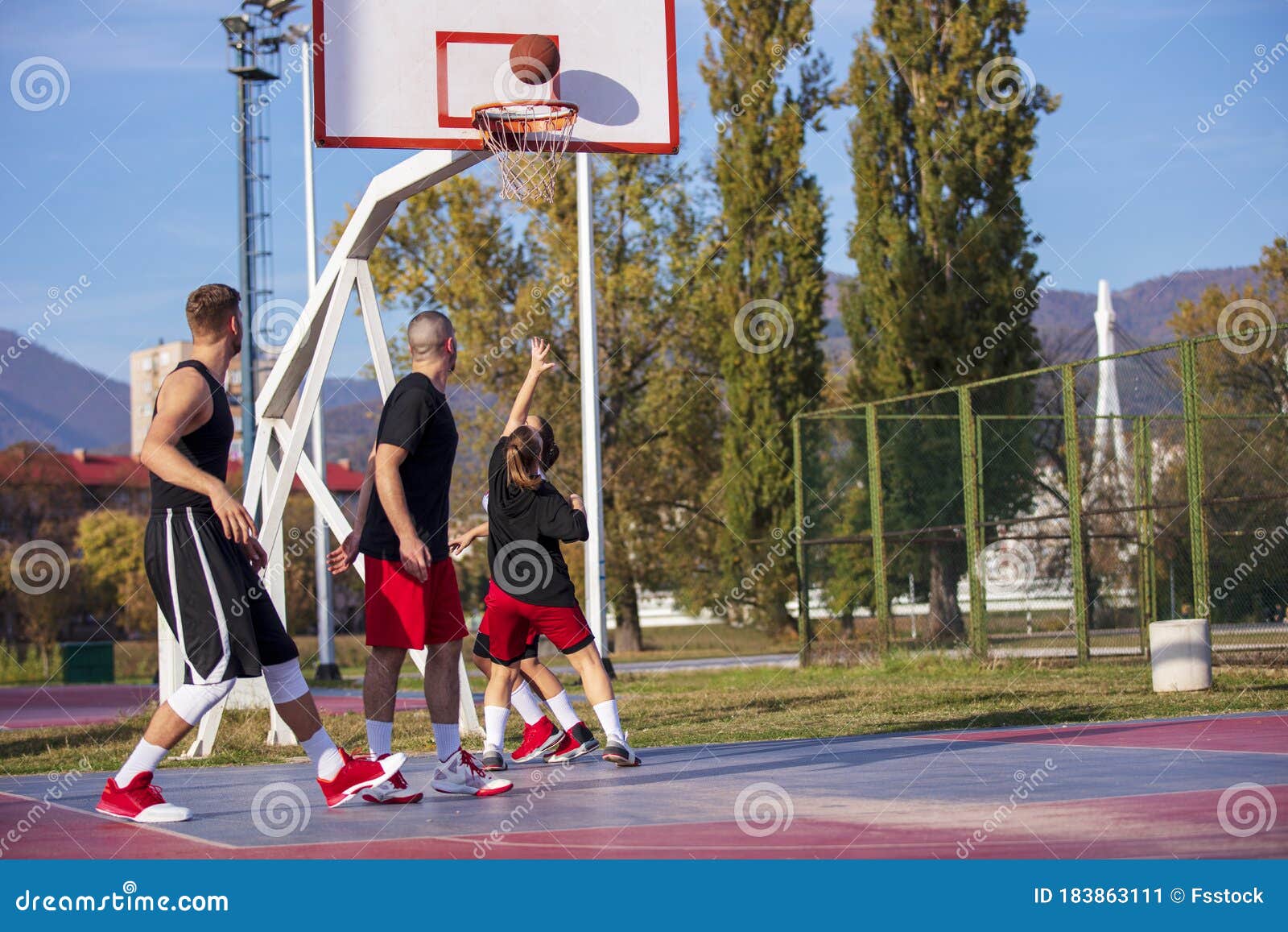 Group of Young Friends Playing Basketball Match Stock Image Image of