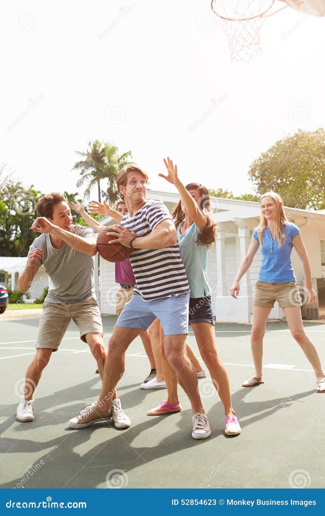 Group of Young Friends Playing Basketball Match Stock Image Image of