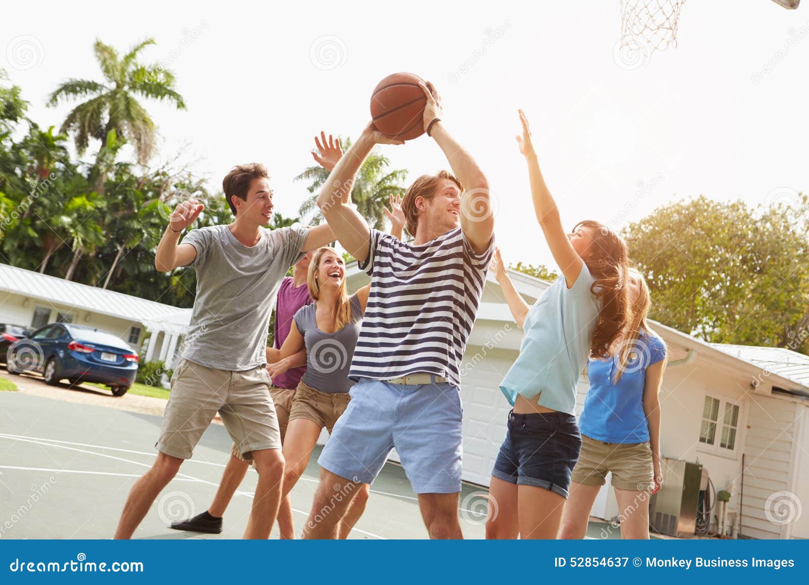 Group of Young Friends Playing Basketball Match Stock Image Image of