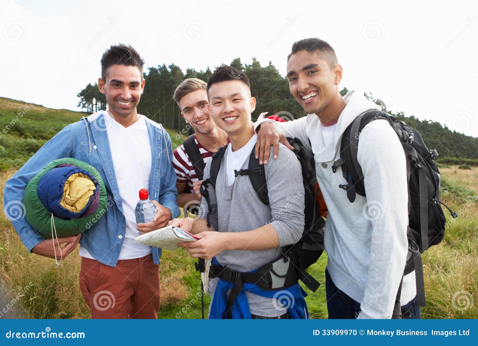 Group of Young Men on Camping Trip in Countryside Stock Photo Image