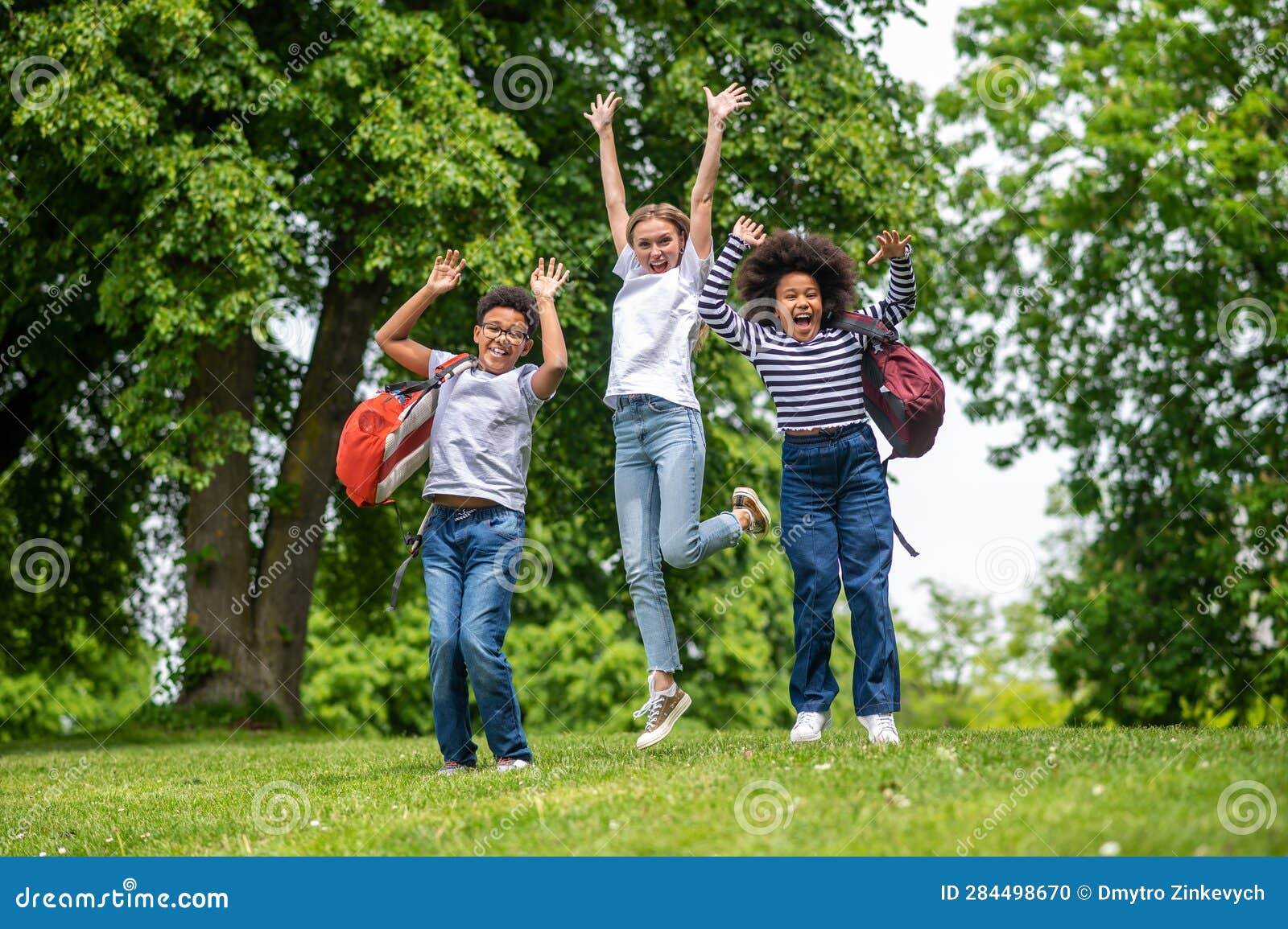 Group of Young People Feeling Excited and Happy in the Park Stock Photo