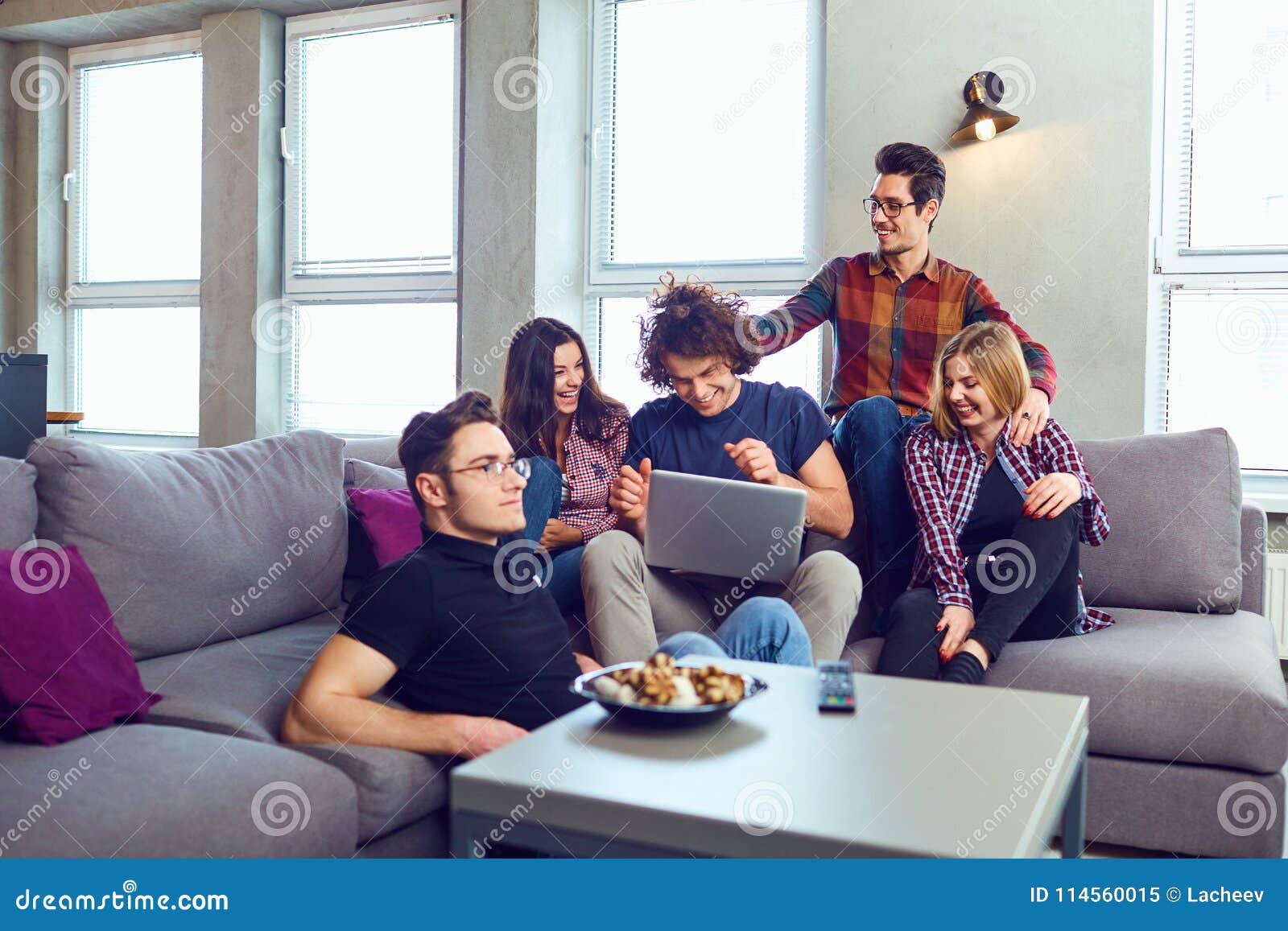 A Group of Young People Have Fun Chatting at a Meeting. Stock Image