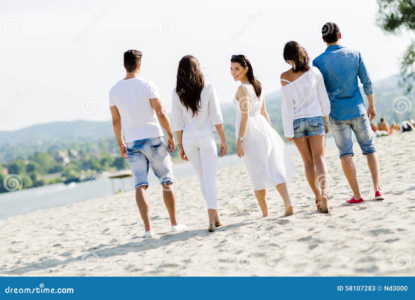 Group of Young People Holding Hands on Beach Stock Image - Image of ...