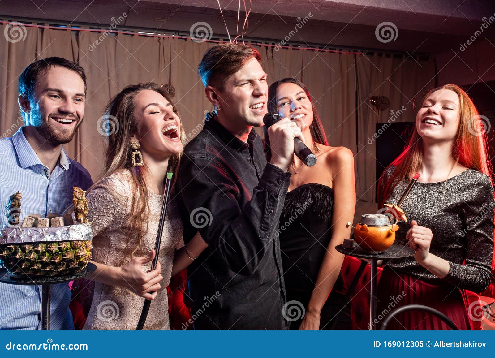 Group of Young People Rocking in Karaoke Bar Stock Image - Image of ...