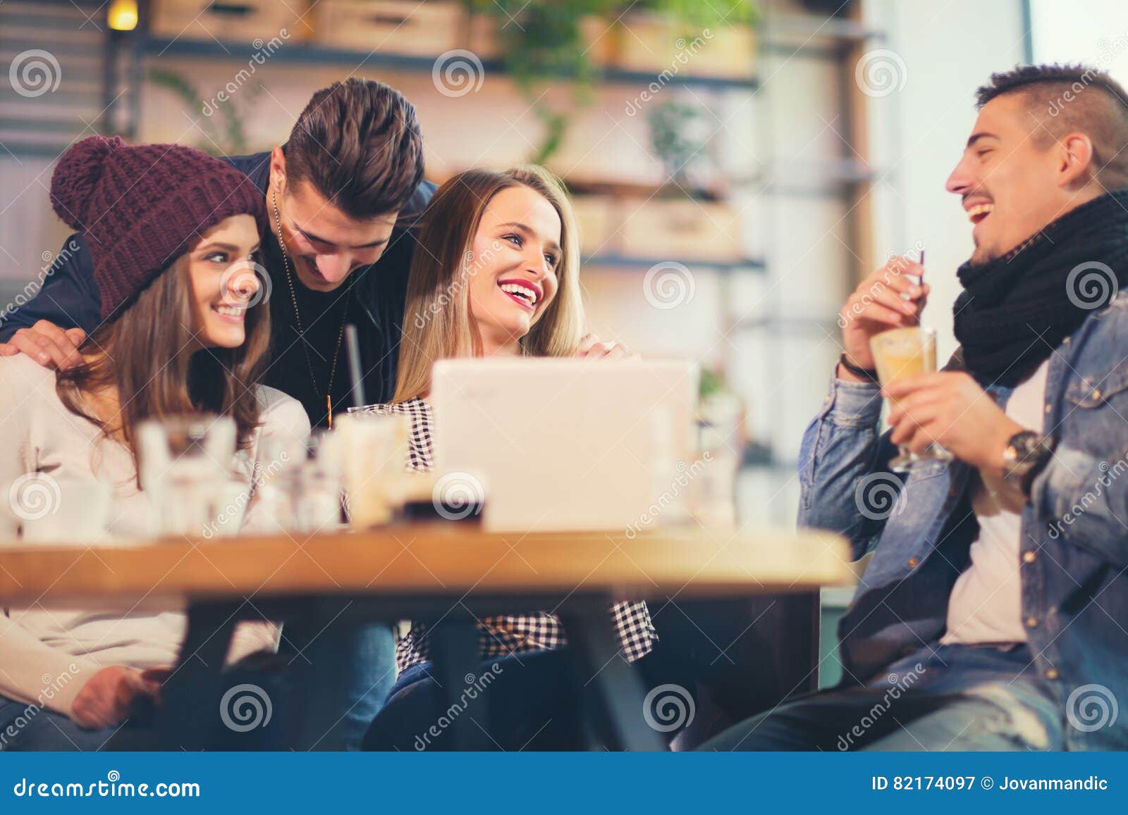 Group of Young People Sitting in a Coffee Shop Stock Image Image of
