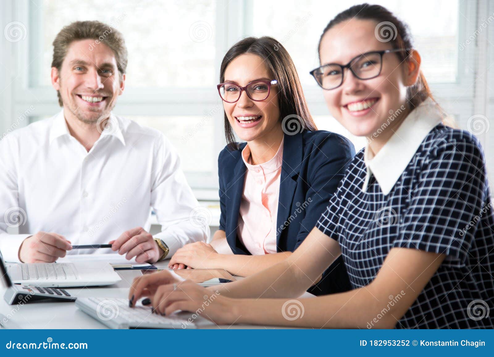 Group Young Successful Business People Sitting Around the Table in a ...