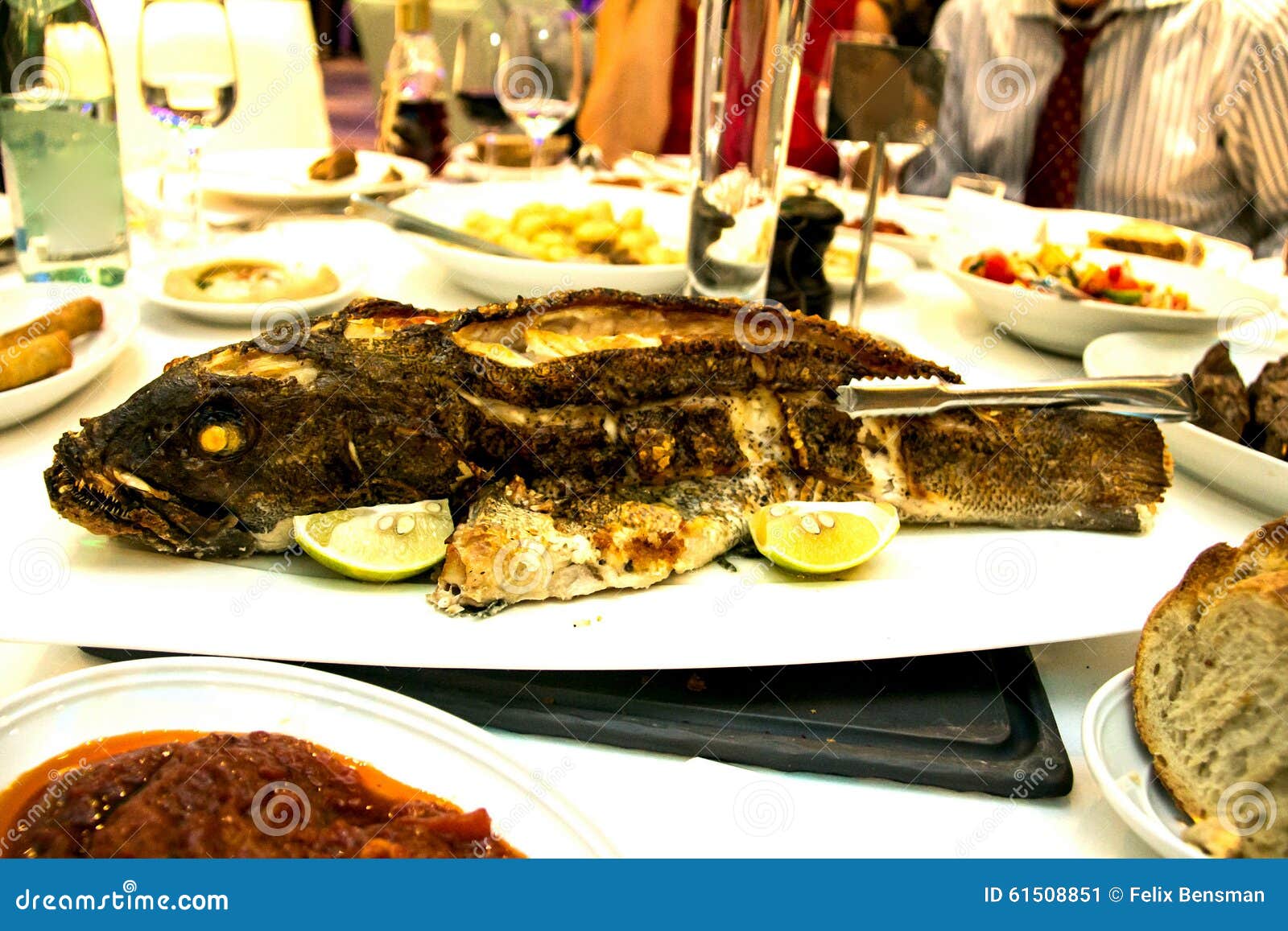 Grouper baked in the oven stock image. Image of pikeperch 61508851