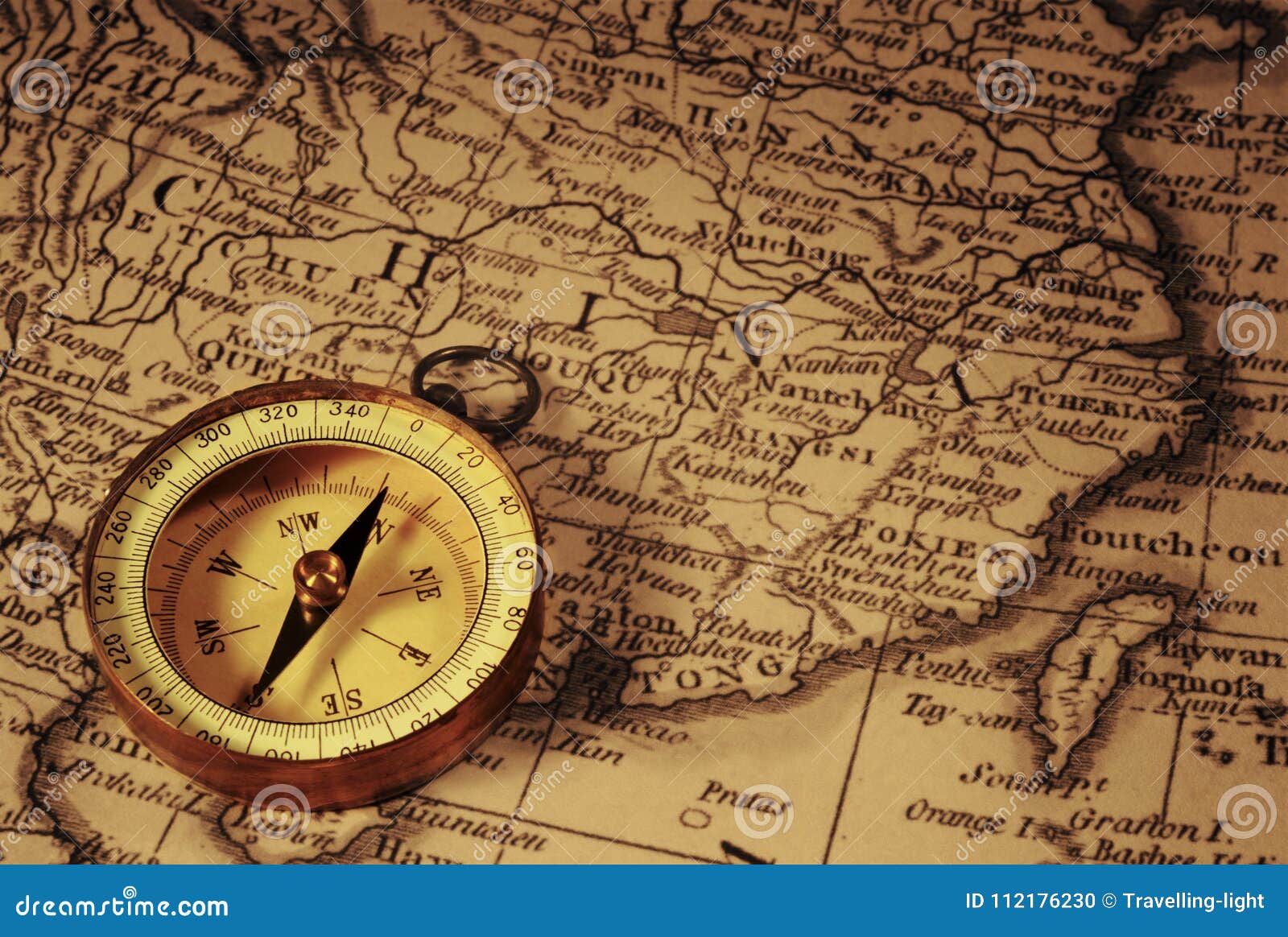 Compass and Chess on old map Stock Photo by ©kwanchaidp