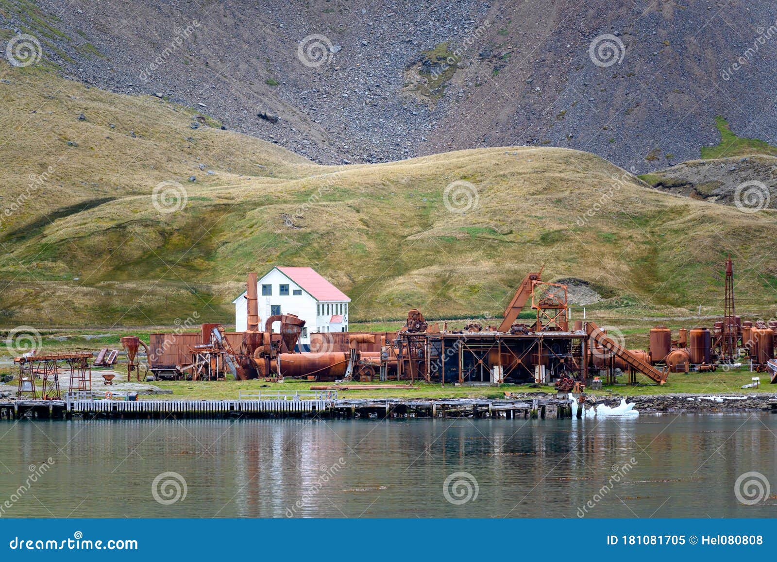 grytviken rusty steel tanks of abandoned whaling station in south georgia. lost places with rusty tanks, old boats, antarctica.