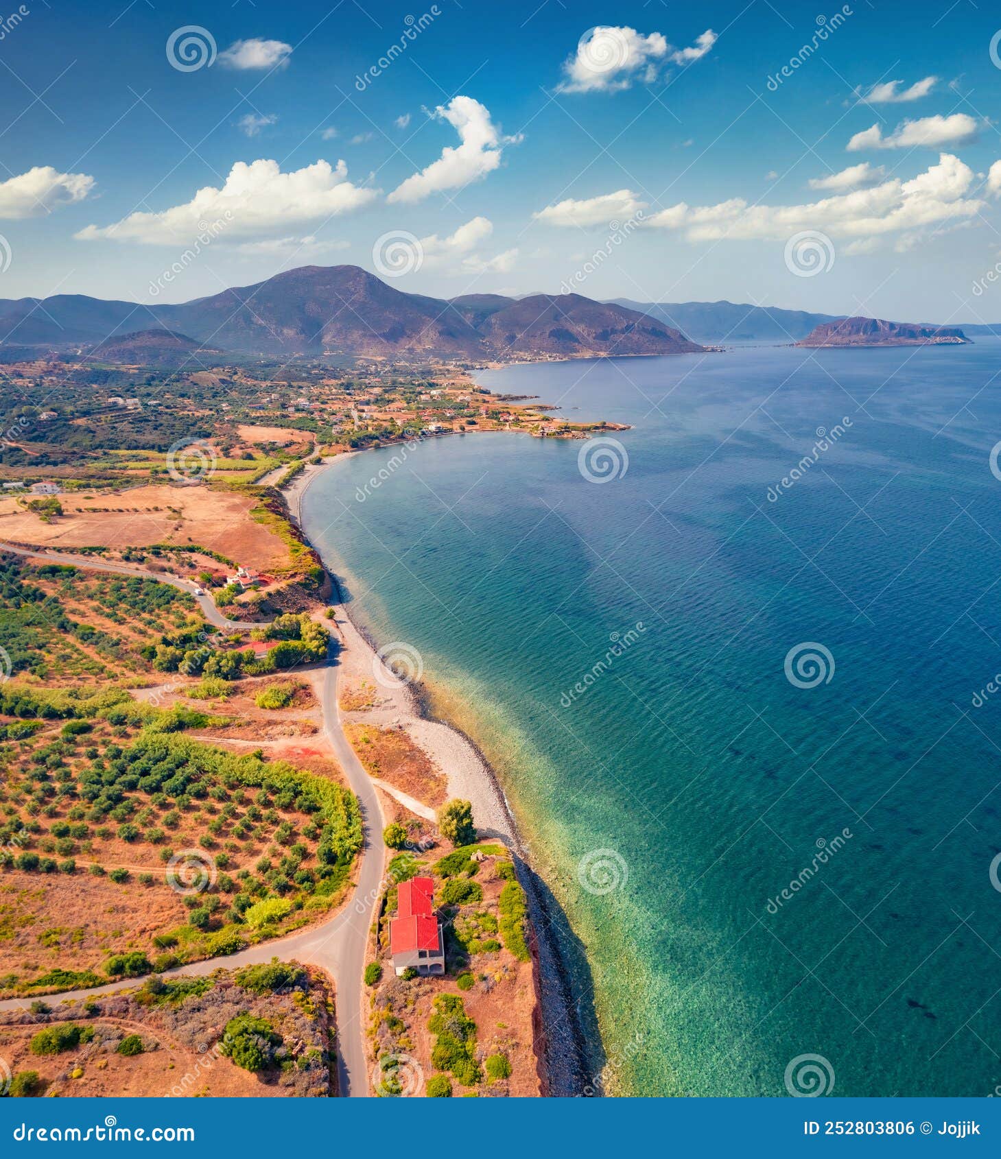 gtuninng summer view of xifias village vith monemvasia mountain on background