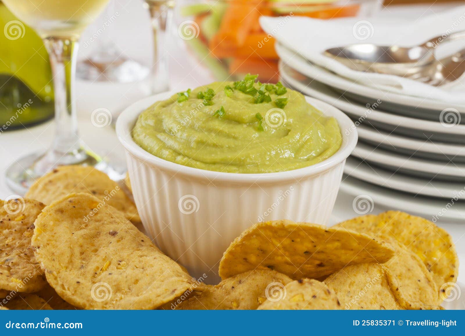 Guacamole with Corn Chips stock image. Image of corn 25835371