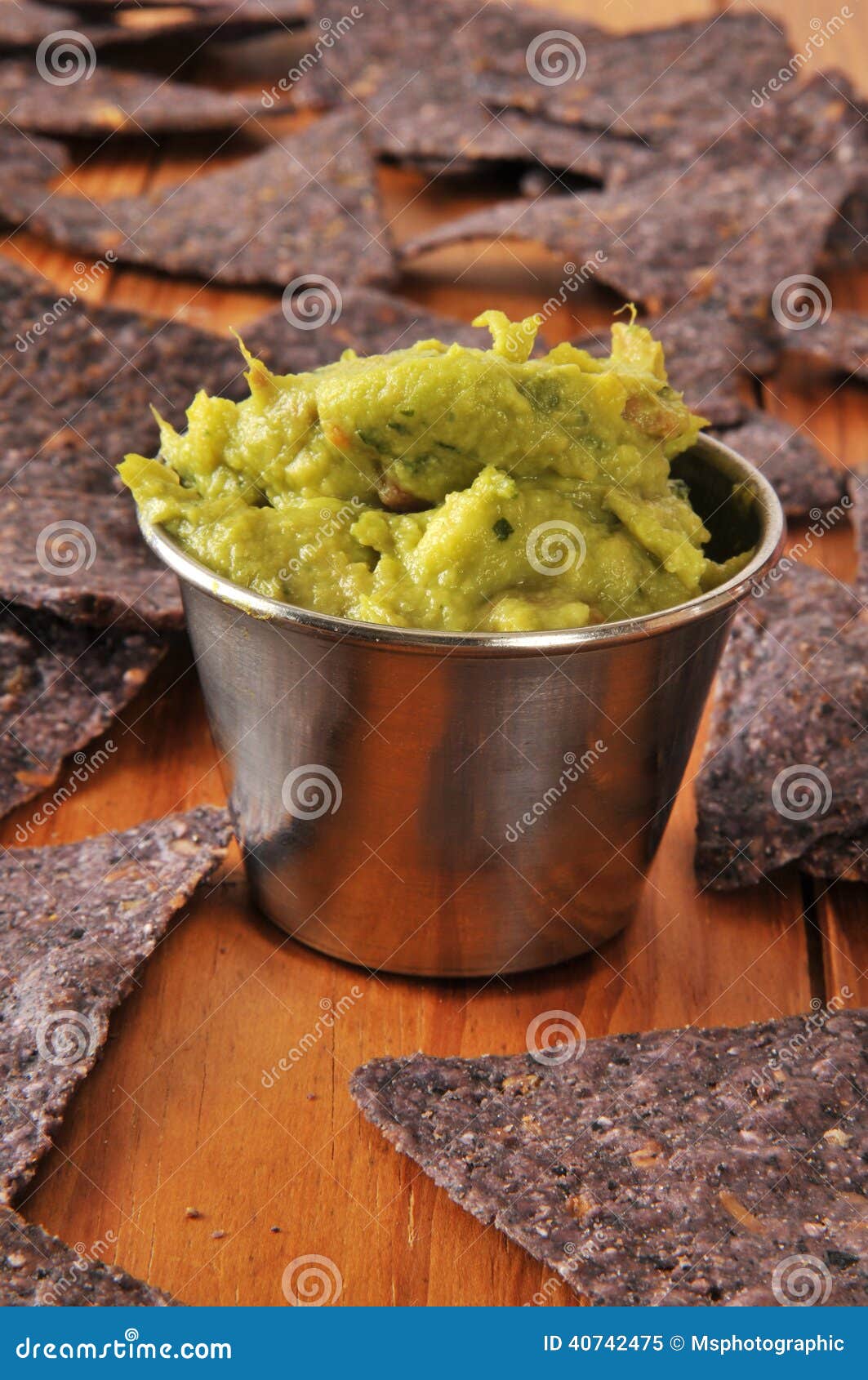 Guacamole and corn chips stock image. Image of wooden 40742475