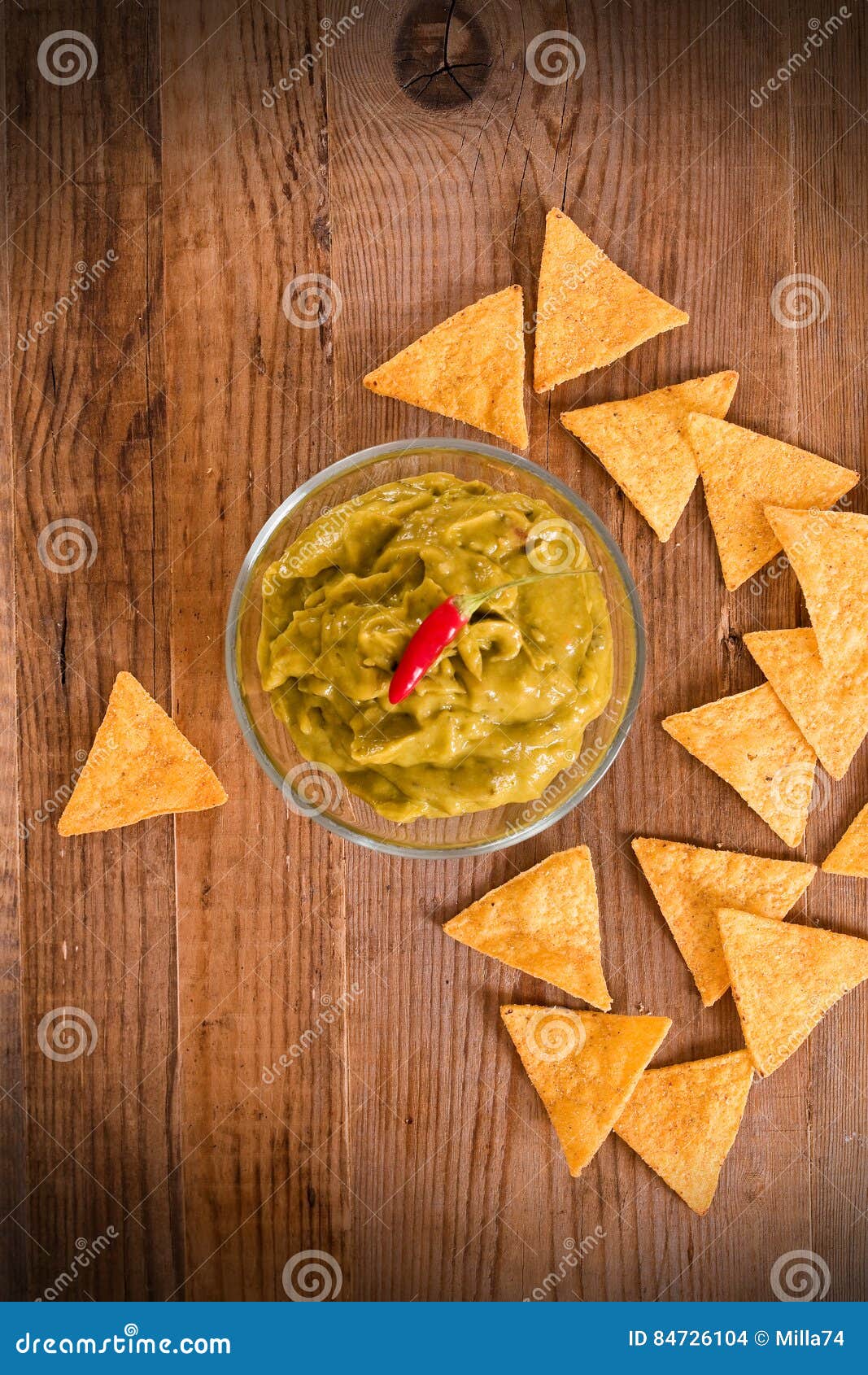 Guacamole and nacho chips. stock photo. Image of chili 84726104