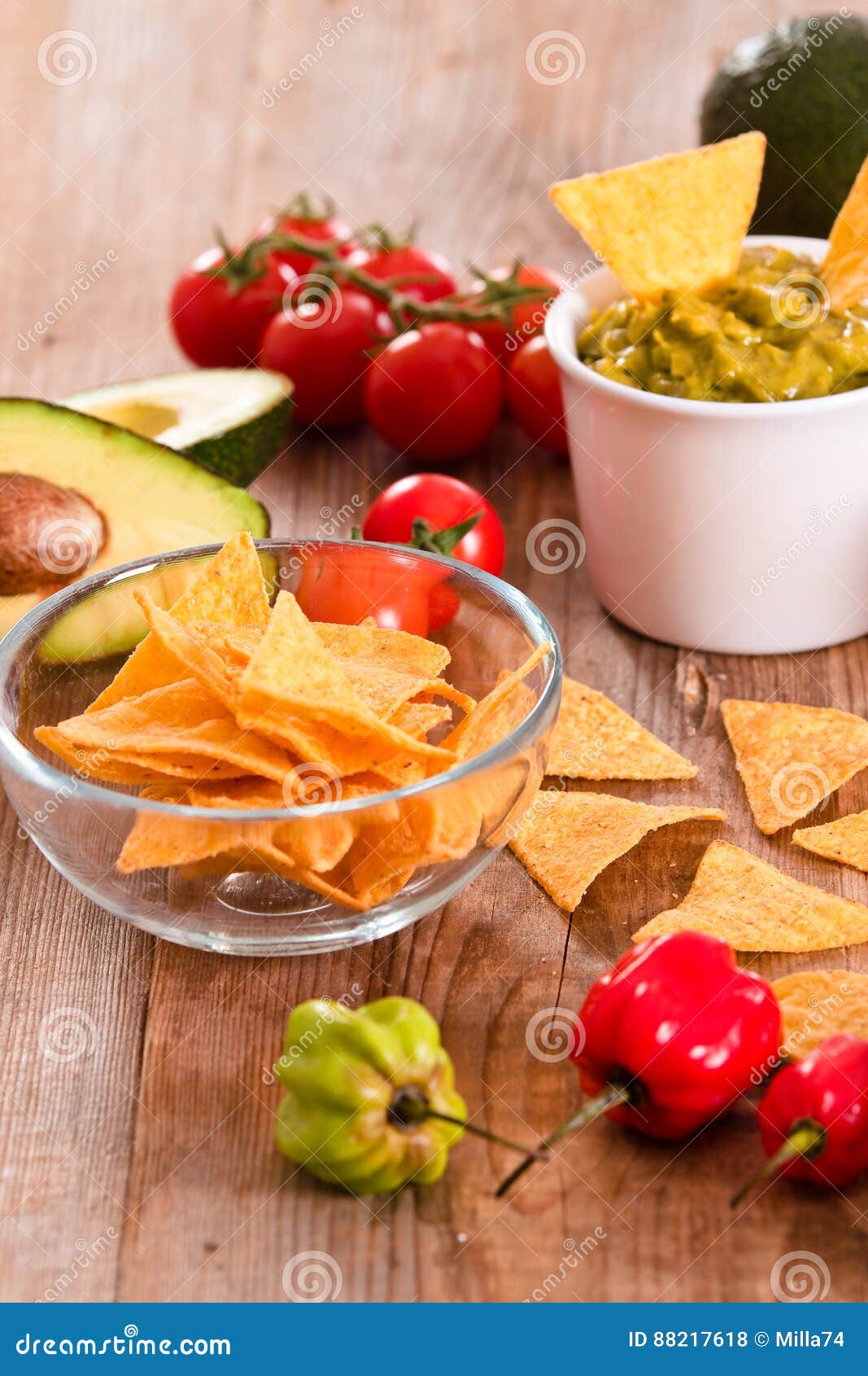 Guacamole and nacho chips. stock photo. Image of green 88217618