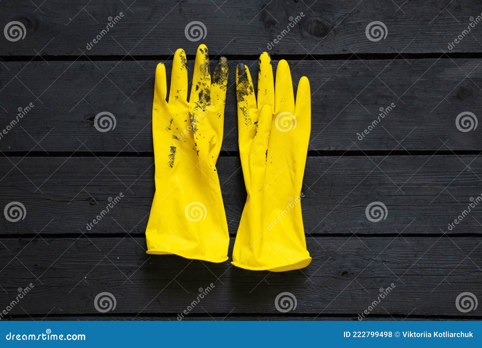 Guanti Gialli Di Gomma in Vernice Nera Su Pavimento Di Legno Nero  Fotografia Stock - Immagine di sfondo, clinico: 222799498