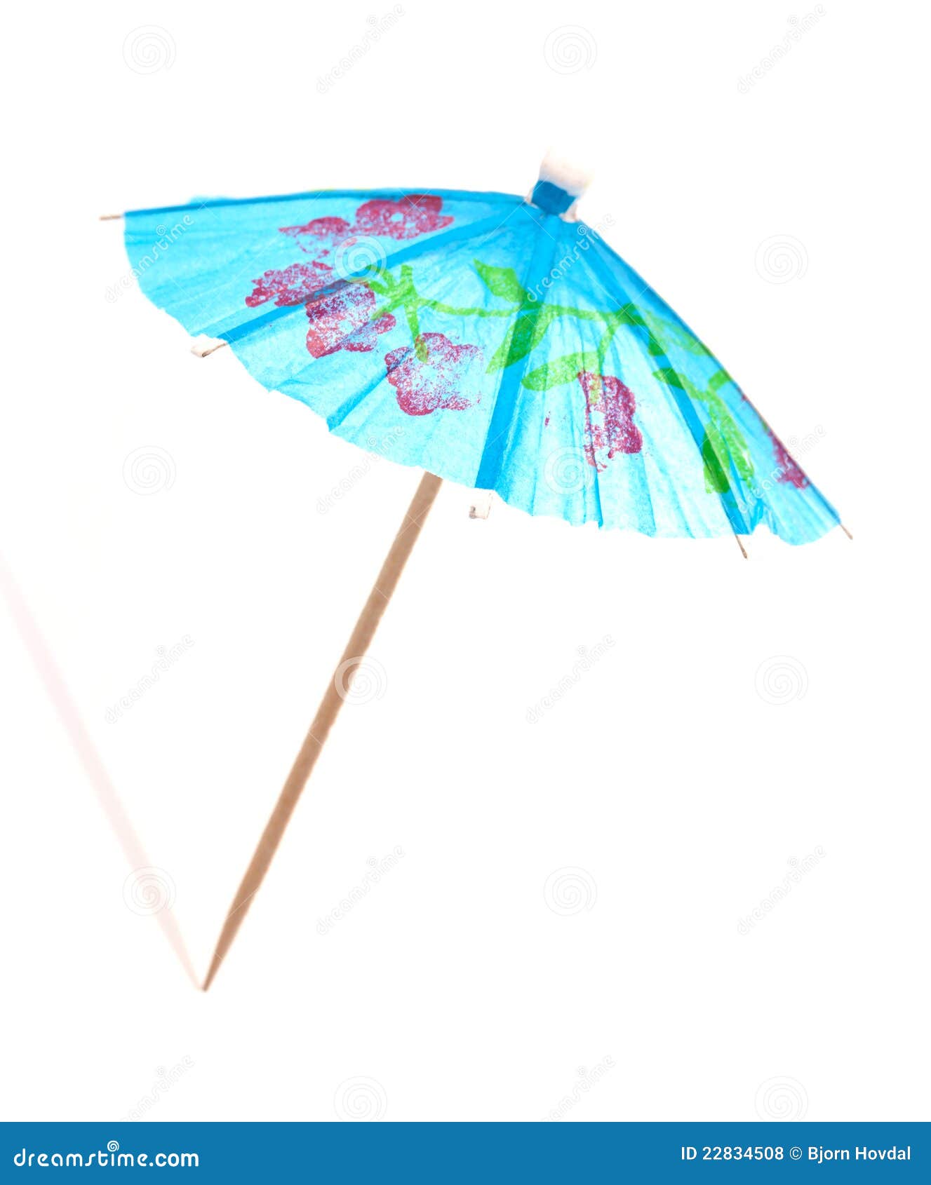 Guarda-chuva do cocktail. Um guarda-chuva azul do cocktail no fundo branco