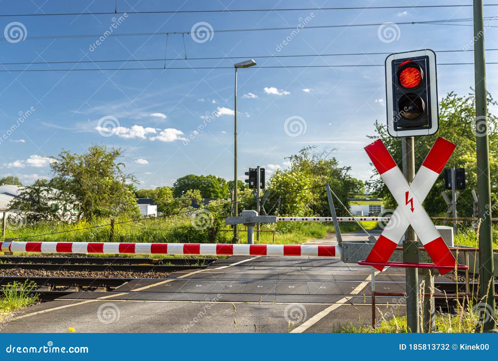 Guarded Railroad Crossing With Closed Barriers Red Warning Light And Cross Of Saint Andrew Stock Photo Image Of Hazard Caution