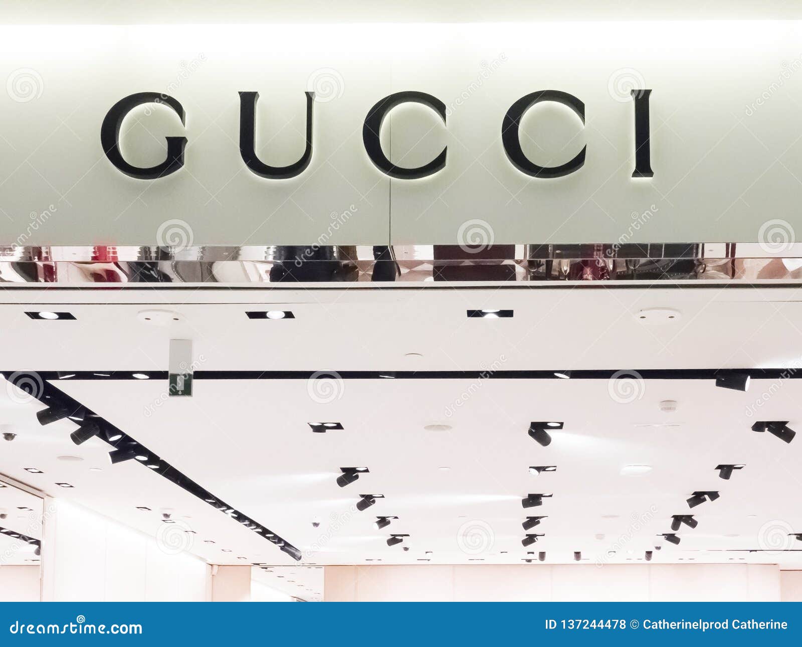 Gucci Store Front In The Mall In Paris Airport. Gucci Is An Italian Luxury Brand Of Fashion And ...