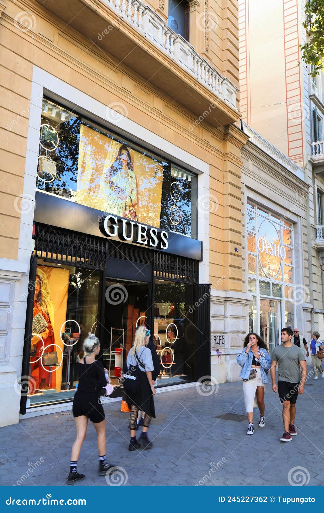 Guess fashion store editorial photography. Image of shopper - 245227362
