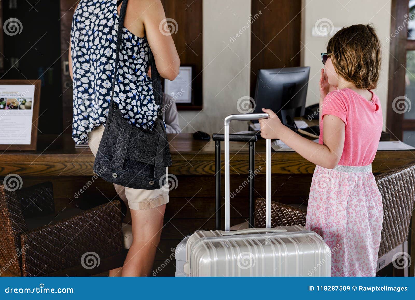 guests checking in into a hotel