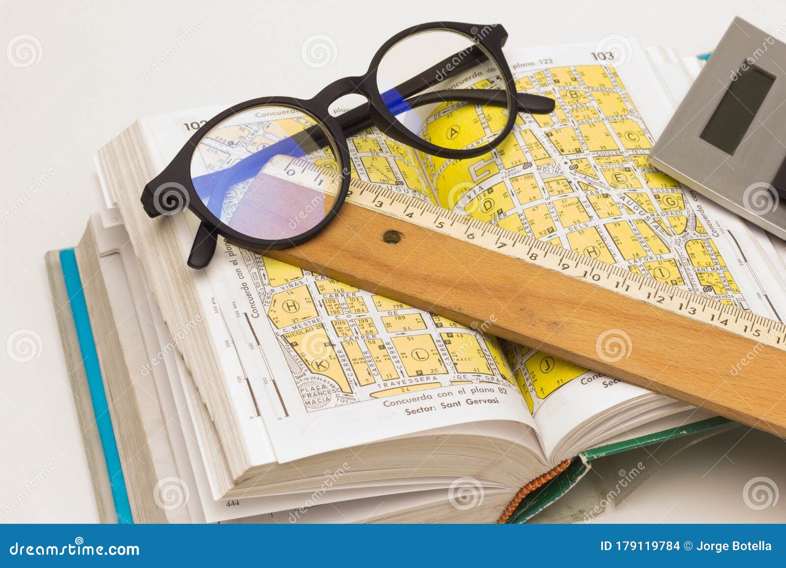 Guide, Plan, Book with the Street Map of a City Stock Photo - Image of