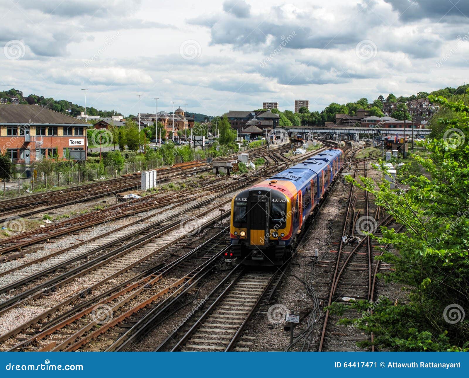 Guildford rail tracks editorial photo. Image of tree 64417471