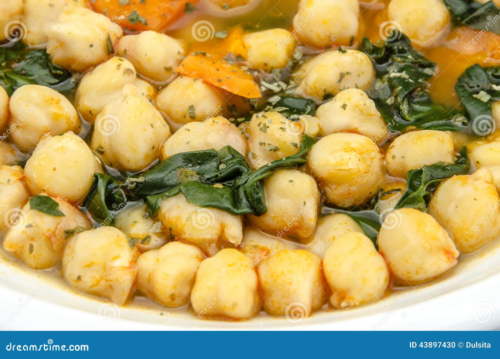 Guisado Del Garbanzo Con Espinaca Foto de archivo Imagen de caliente