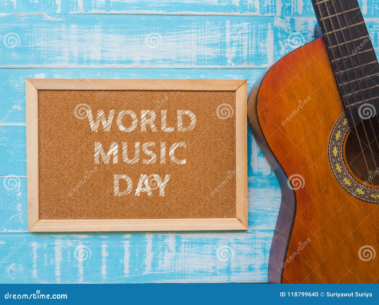 The Guitar and Board with WORLD MUSIC DAY Text on Blue Wooden Te Stock  Photo - Image of greeting, blue: 118799640