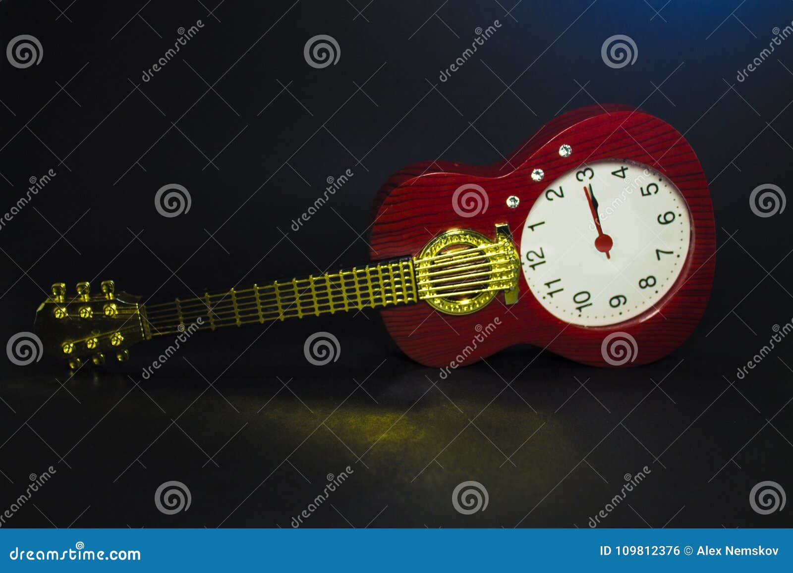 Guitarclock on Dark Background Stock Photo Image of hand, dark 109812376