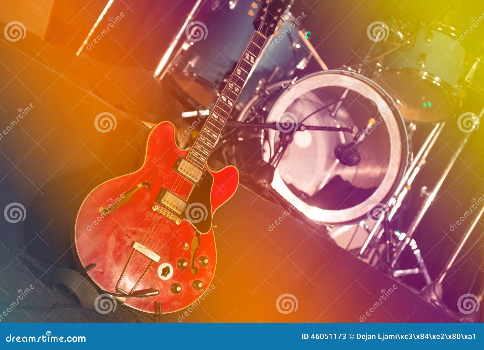 Guitar and drums on stage stock image. Image of band 46051173