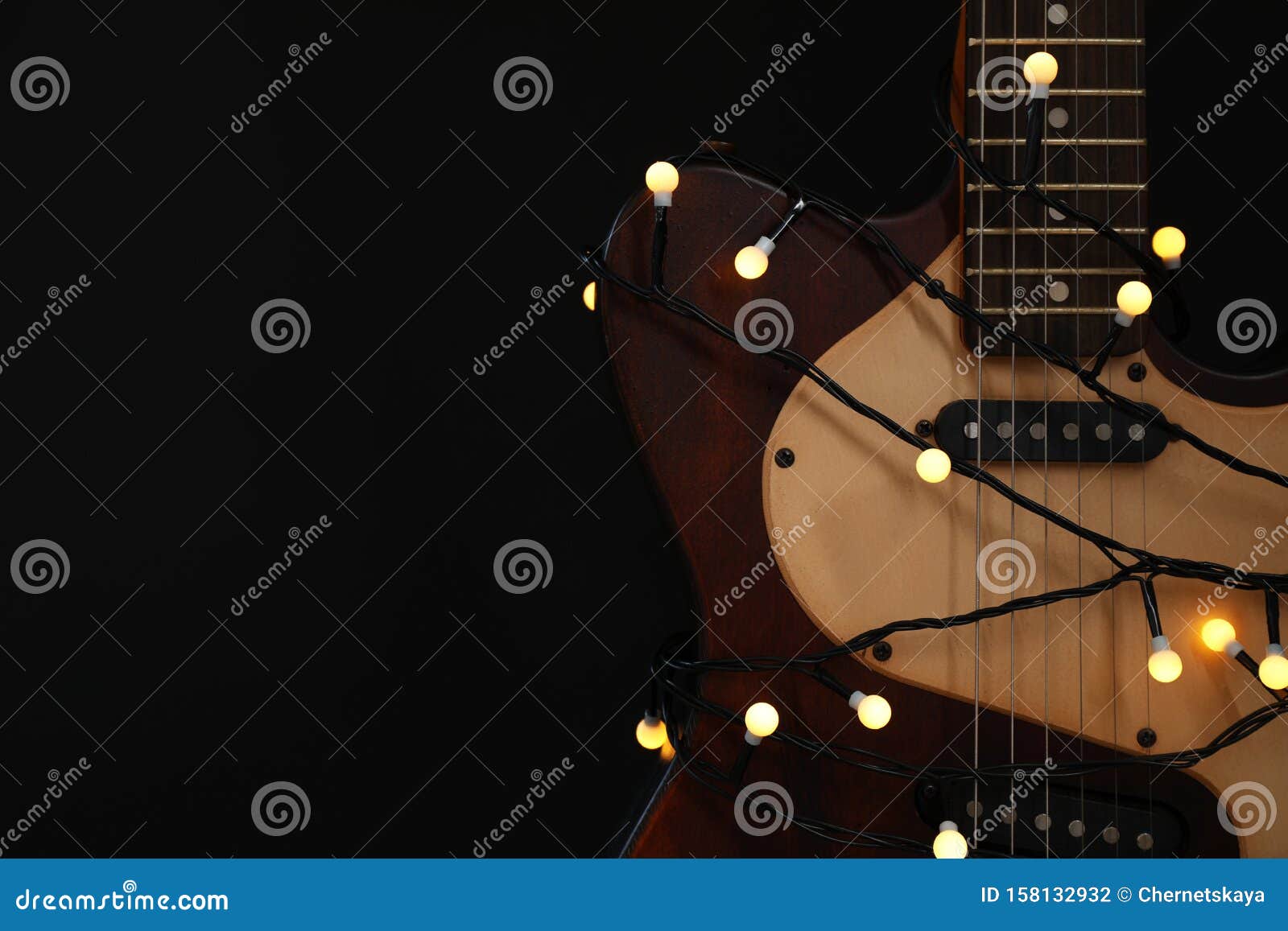 Guitar With Golden Lights On Black Background Christmas Music Stock Photo Image Of Decorative Garland 158132932