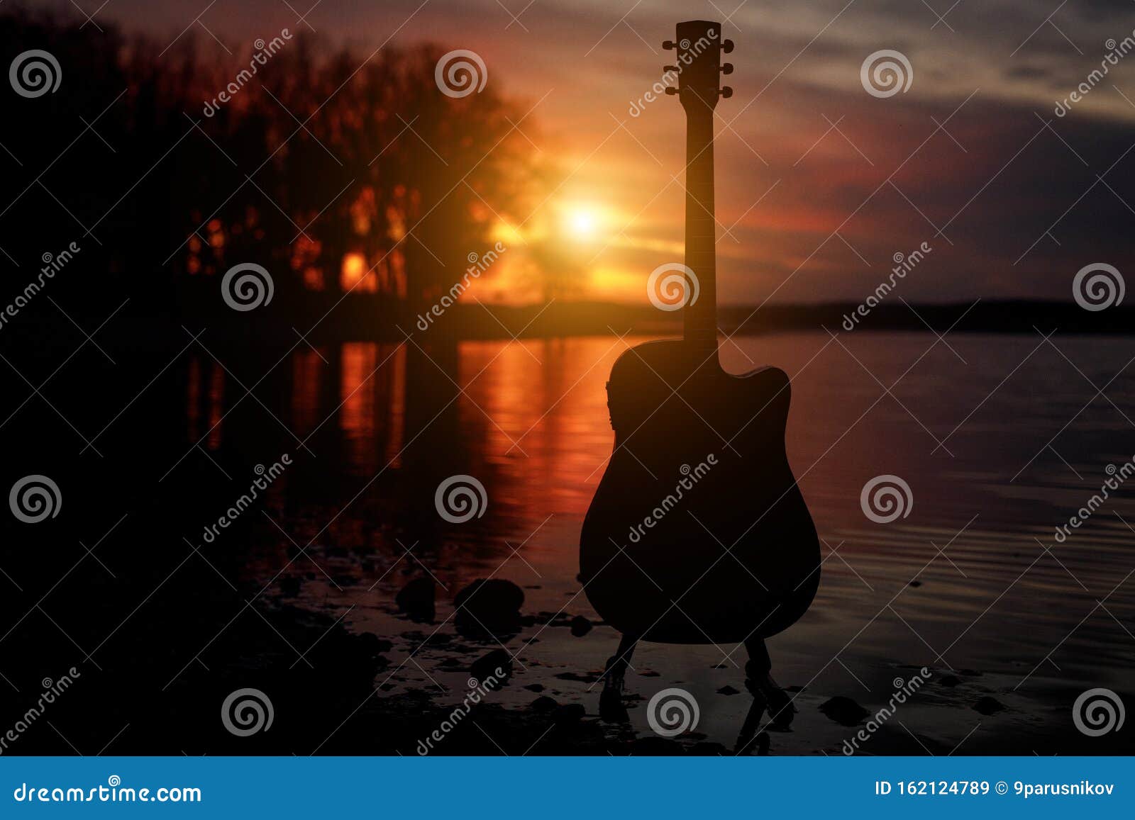 Download Guitar Silhouette At Sunset. Sea And Trees On Background ...