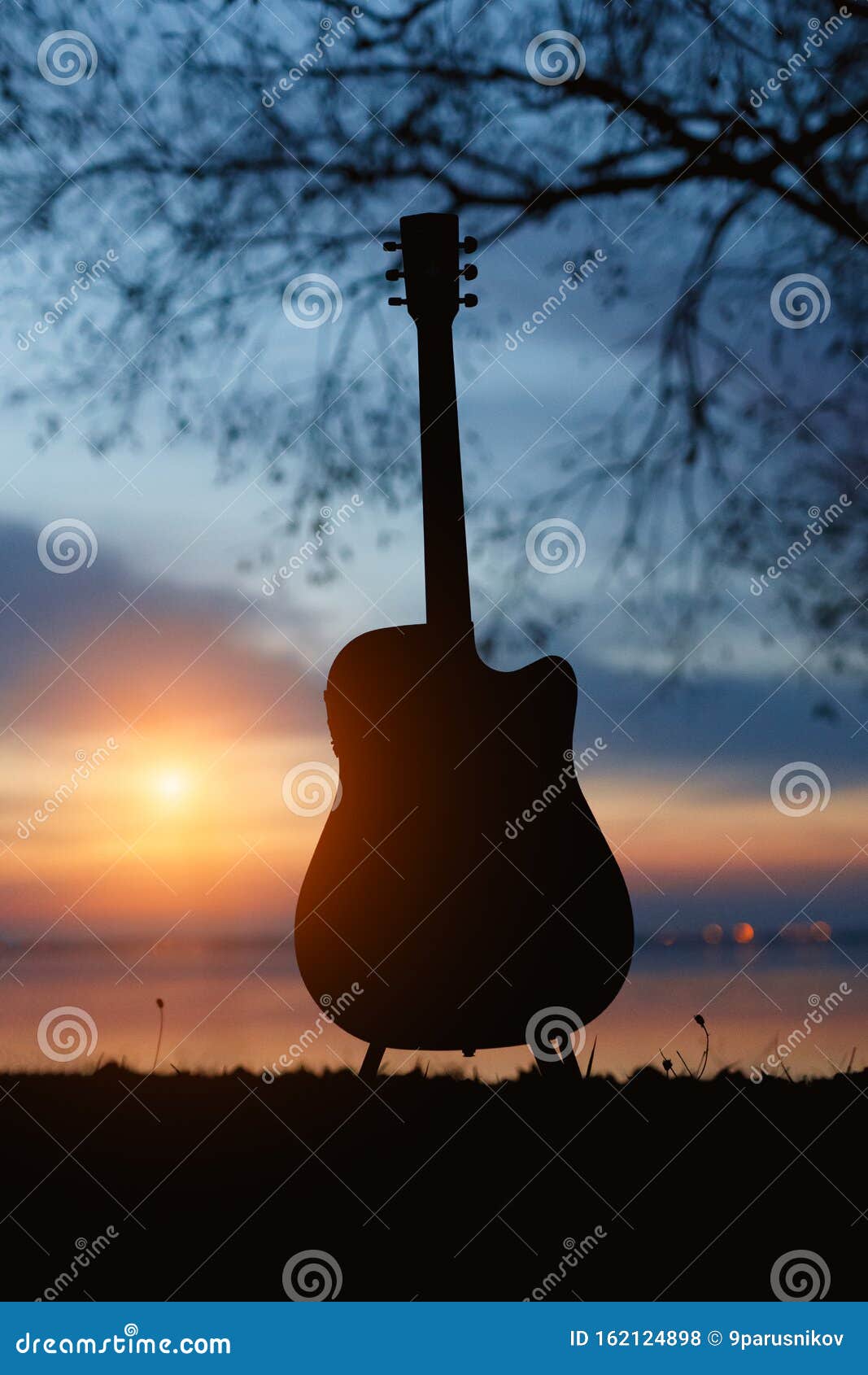 Download Guitar Silhouette At Sunset. Sea And Trees On Background ...