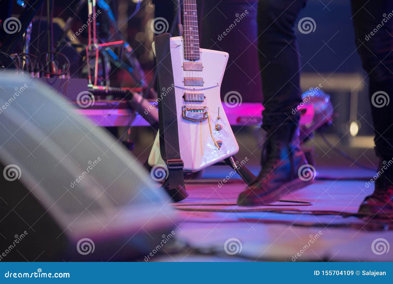 Guitar stand on the stage stock image. Image of audio 155704109