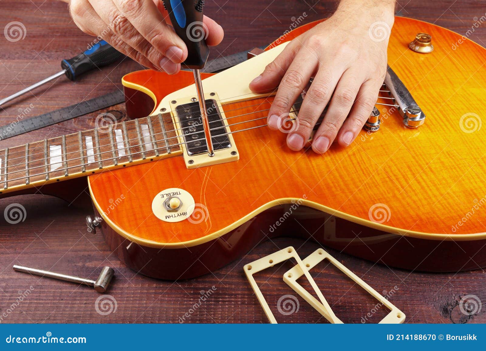 Guitar Technician Tune the Height Pickups on Electric Guitar at Workplace Stock Photo Image of
