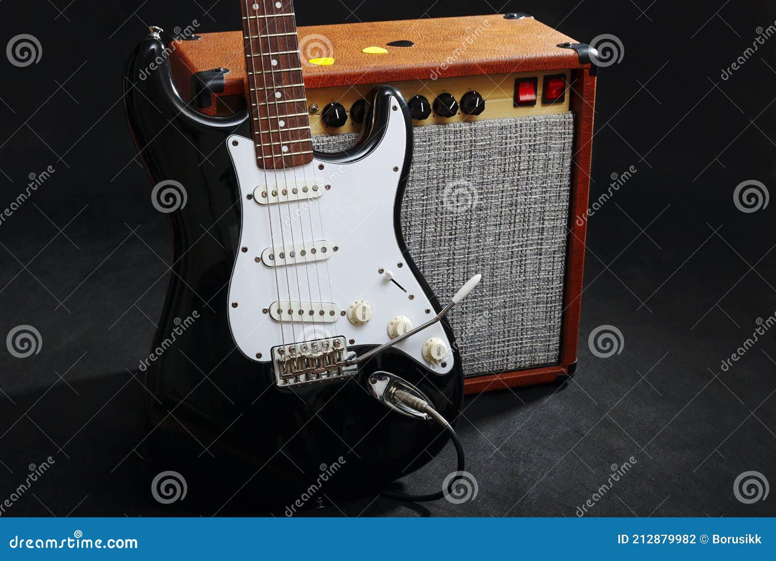 Guitar Tube Combo Amplifier With Honey Sunburst Guitar On Black