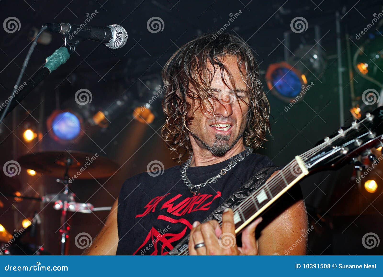 guitarist playing in a band