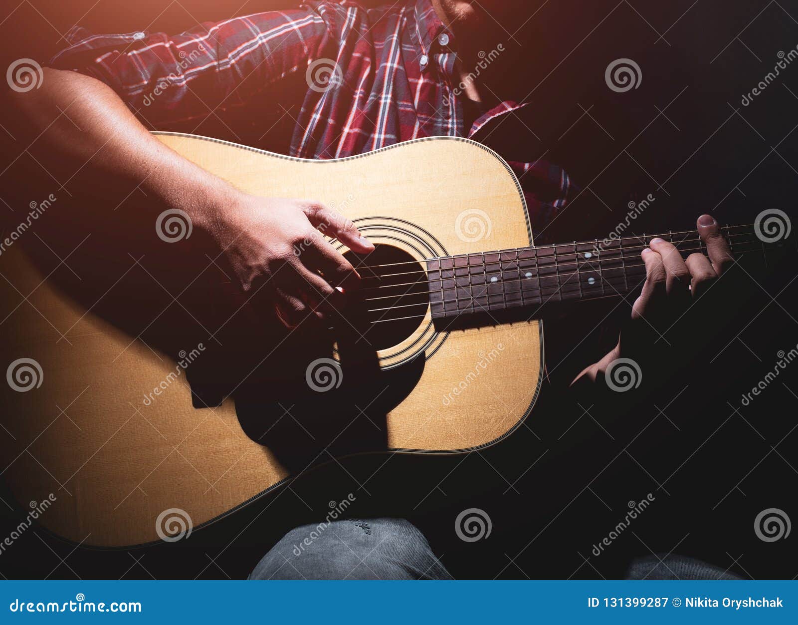 GUITARIST PLAYS on the ACOUSTIC GUITAR on the STAGE Stock Image Image