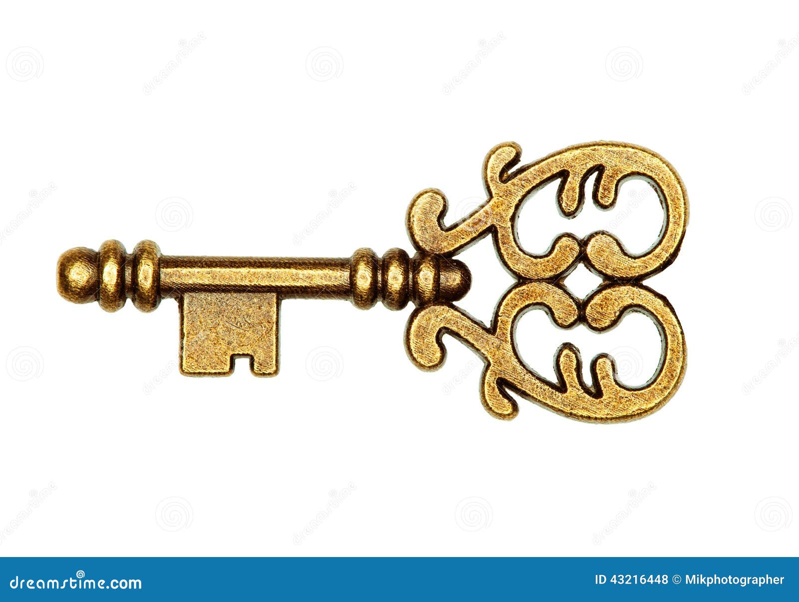 Золотой ключ на белом фоне