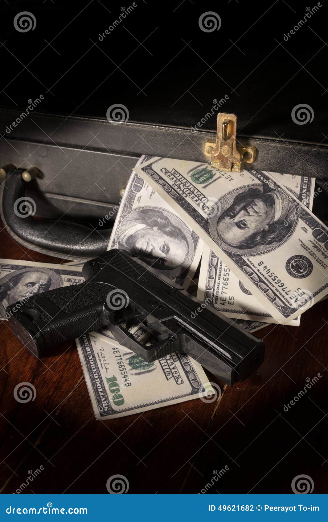Gun and Dollar Bill in Briefcase. Stock Photo Image of life, debt
