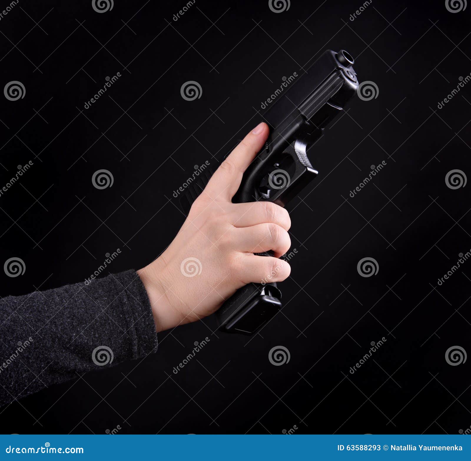 Gun in a hand stock image. Image of danger, closeup, aiming 63588293